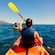 A Guest kayaks in the Atlantic Ocean